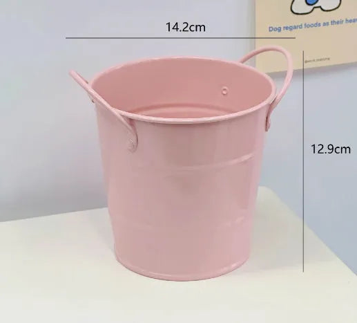 Round metal desktop pen holder showing colour options including green, pink, red, white and yellow