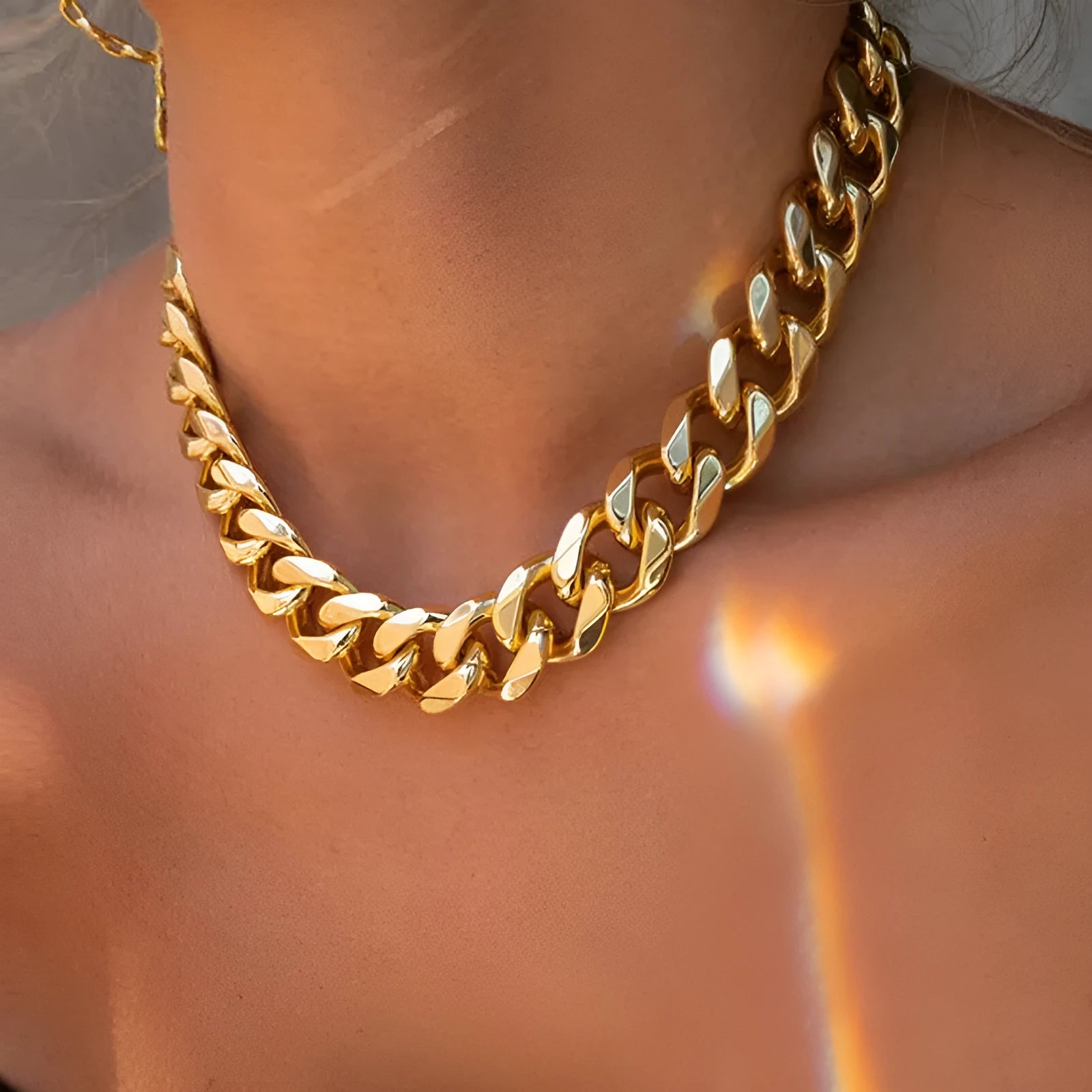 Gold-coloured thick chain necklace for women, measuring 32cm in length.