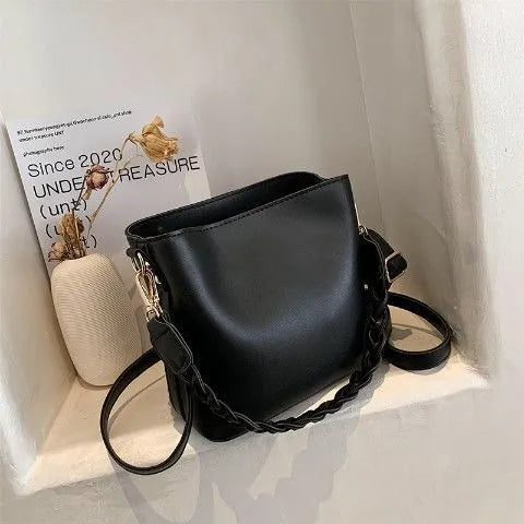 Woven PU one-shoulder crossbody bucket bag in retro style, shown in khaki colour.