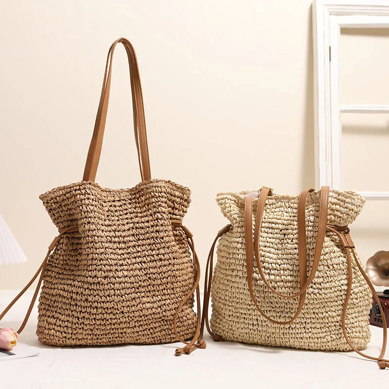 Large capacity paper straw drawstring shoulder bag in beige with double straps and inner pocket