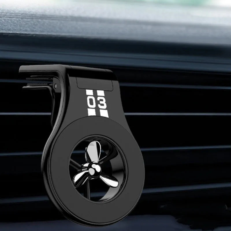 Black magnetic car air vent phone holder with adjustable bracket and fragrance diffuser