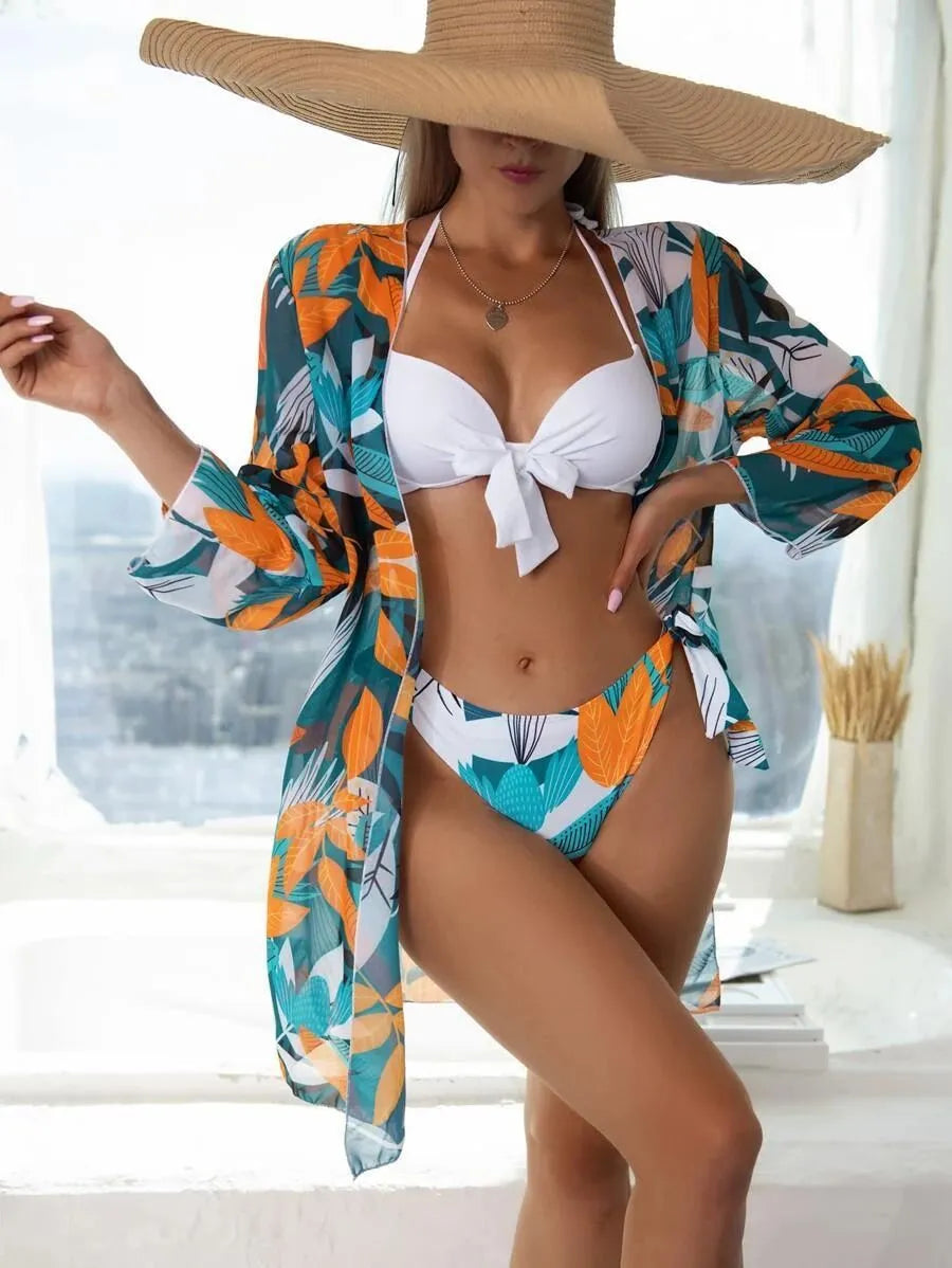 Women's three-piece bikini swimsuit set with mesh split detail in a quick-dry fabric.