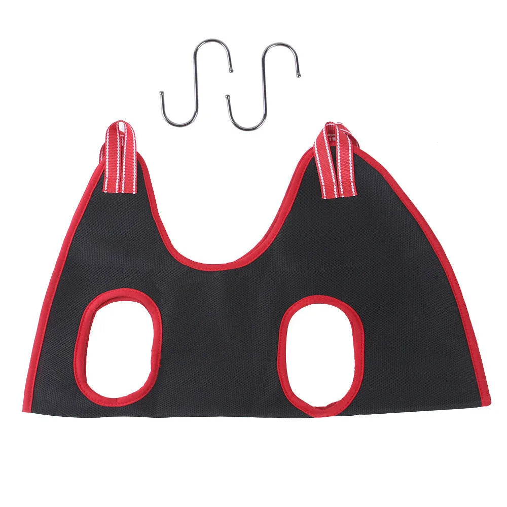 Mesh pet grooming hammock restraint bag hanging in a doorway for cat nail trimming or bath time.