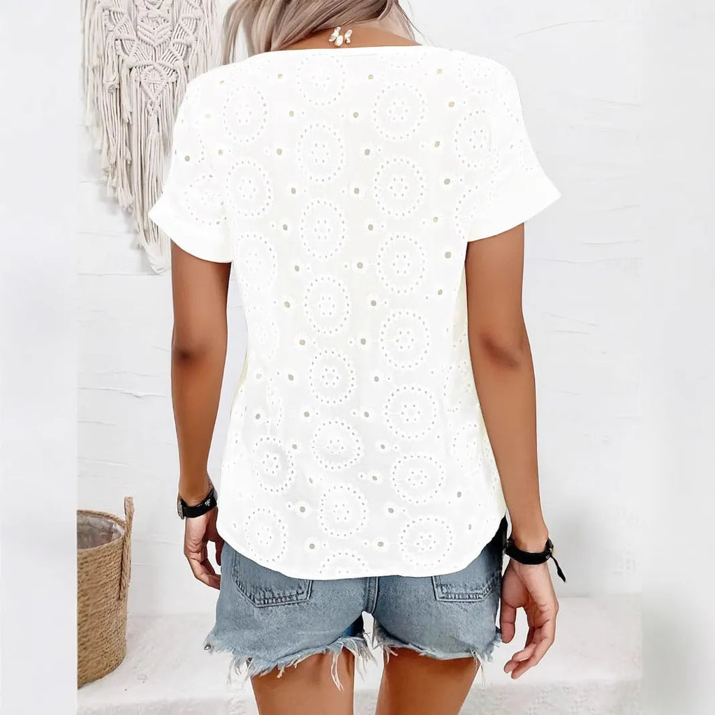 White women's V-neck short sleeve T-shirt with a hollow design detail and loose fit.