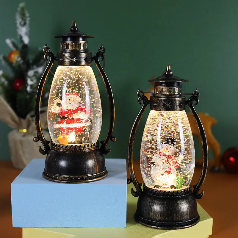 Plastic Christmas oil lamp decoration with LED light showing snowman figurine inside crystal ball dome.