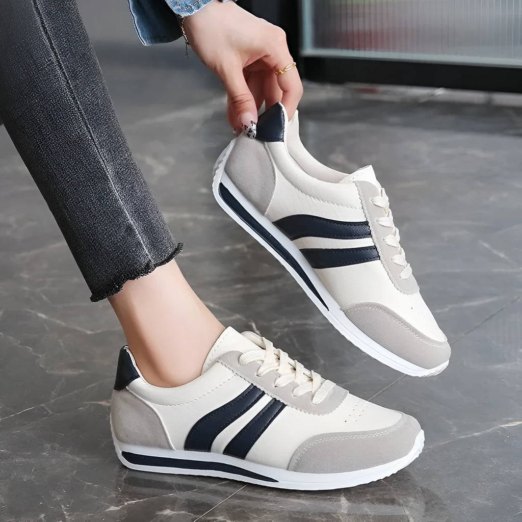 Red and blue lace-up running sneaker with soft rubber sole and PU mesh upper
