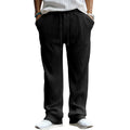 Man wearing loose high-waist striped casual trousers in Army Green, showing the straight leg fit.