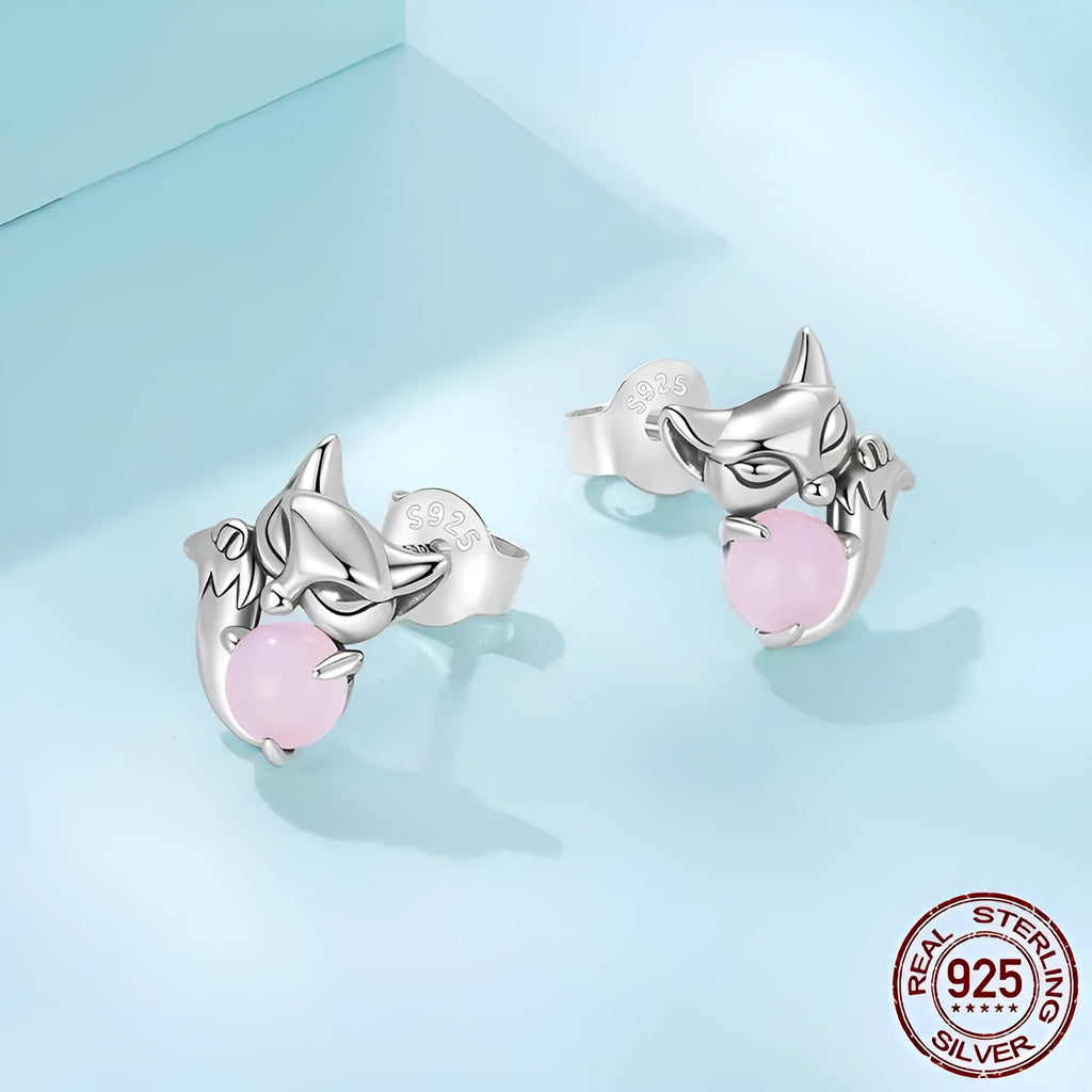 S925 sterling silver fox stud earrings with green jade inlay on white background