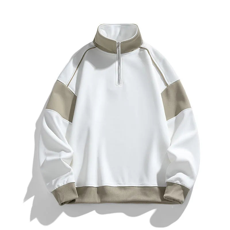 A man's thin corduroy hooded pullover sweater with drop shoulders and loose lapels, in a neutral colour.
