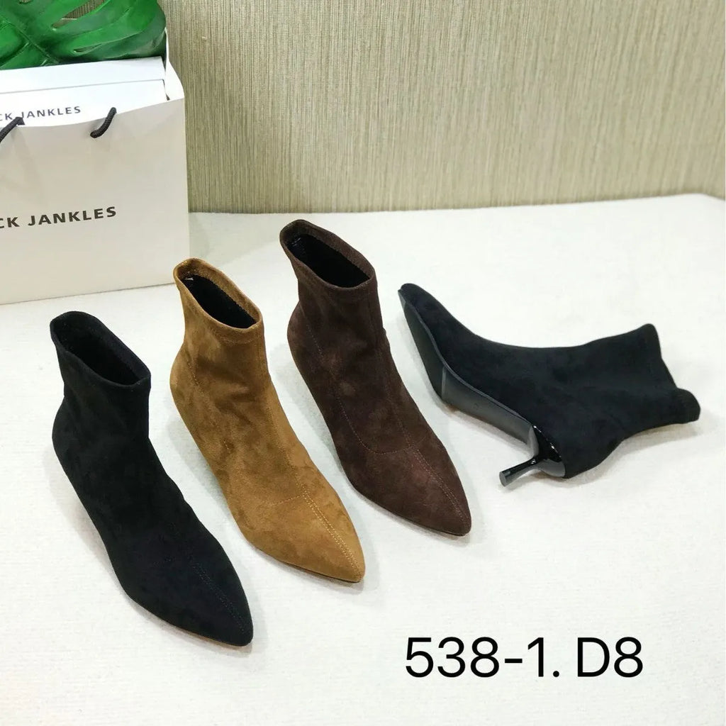 Black pointed toe women's ankle boots with stiletto heel and mid-calf height