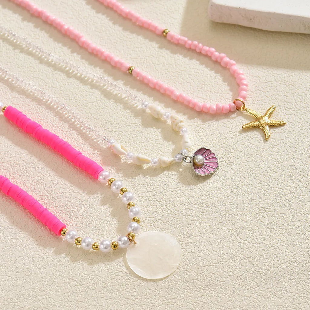 Polymer clay beaded necklace with multi-layer twin clavicle chain and geometric alloy pendant on female model