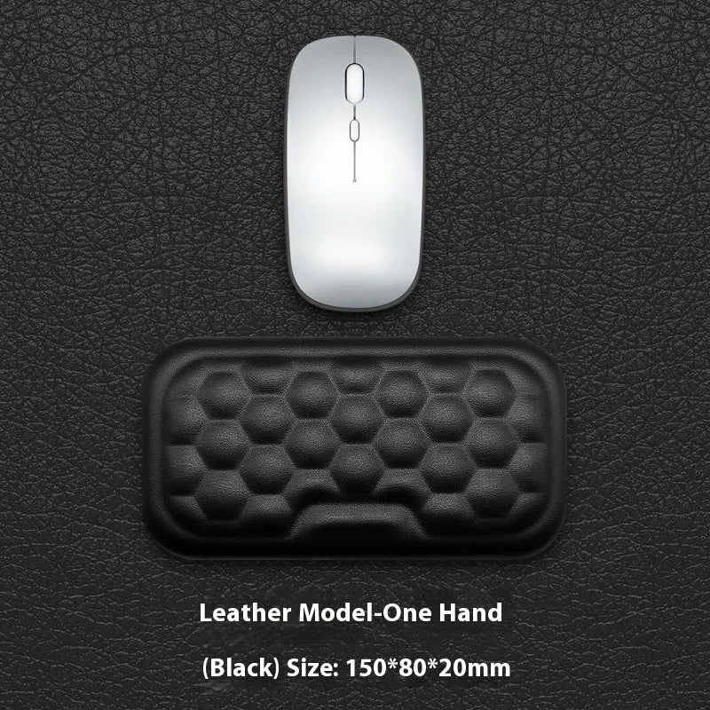 Memory foam mouse wrist rest with silicone base in black cloth and grey leather style options.
