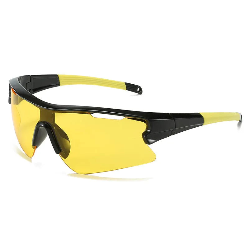 Windproof sports cycling sunglasses in black frame with grey lens on outdoor background.
