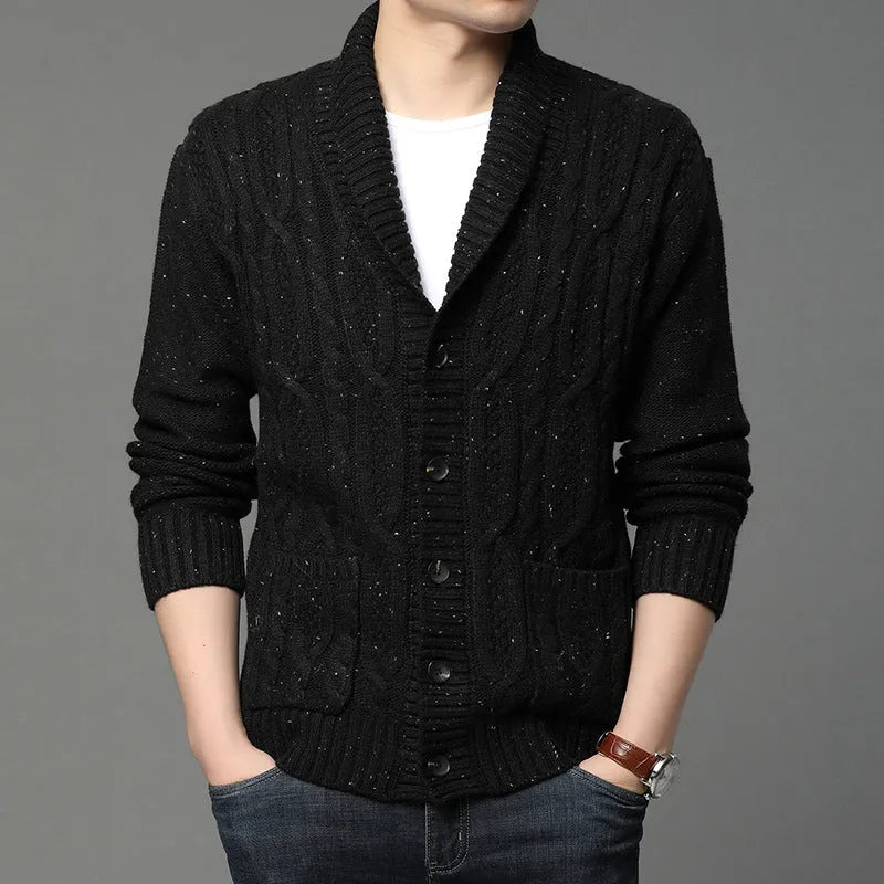 Man wearing a dark grey Korean style jacquard knitted cardigan jacket with a straight cut.
