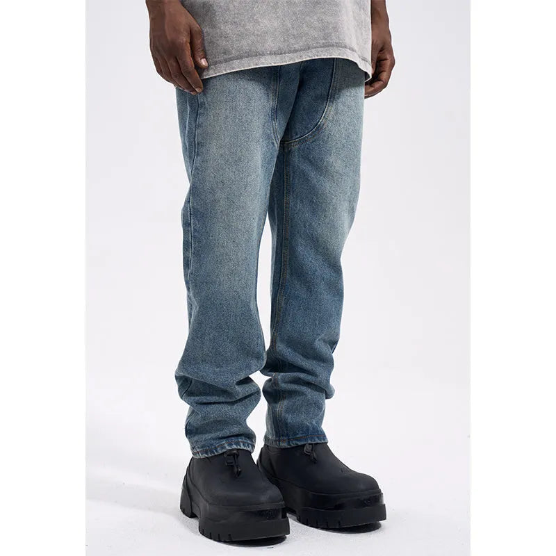 Men's casual western vintage jeans in washed blue, water-washed denim with zipper fly, front view
