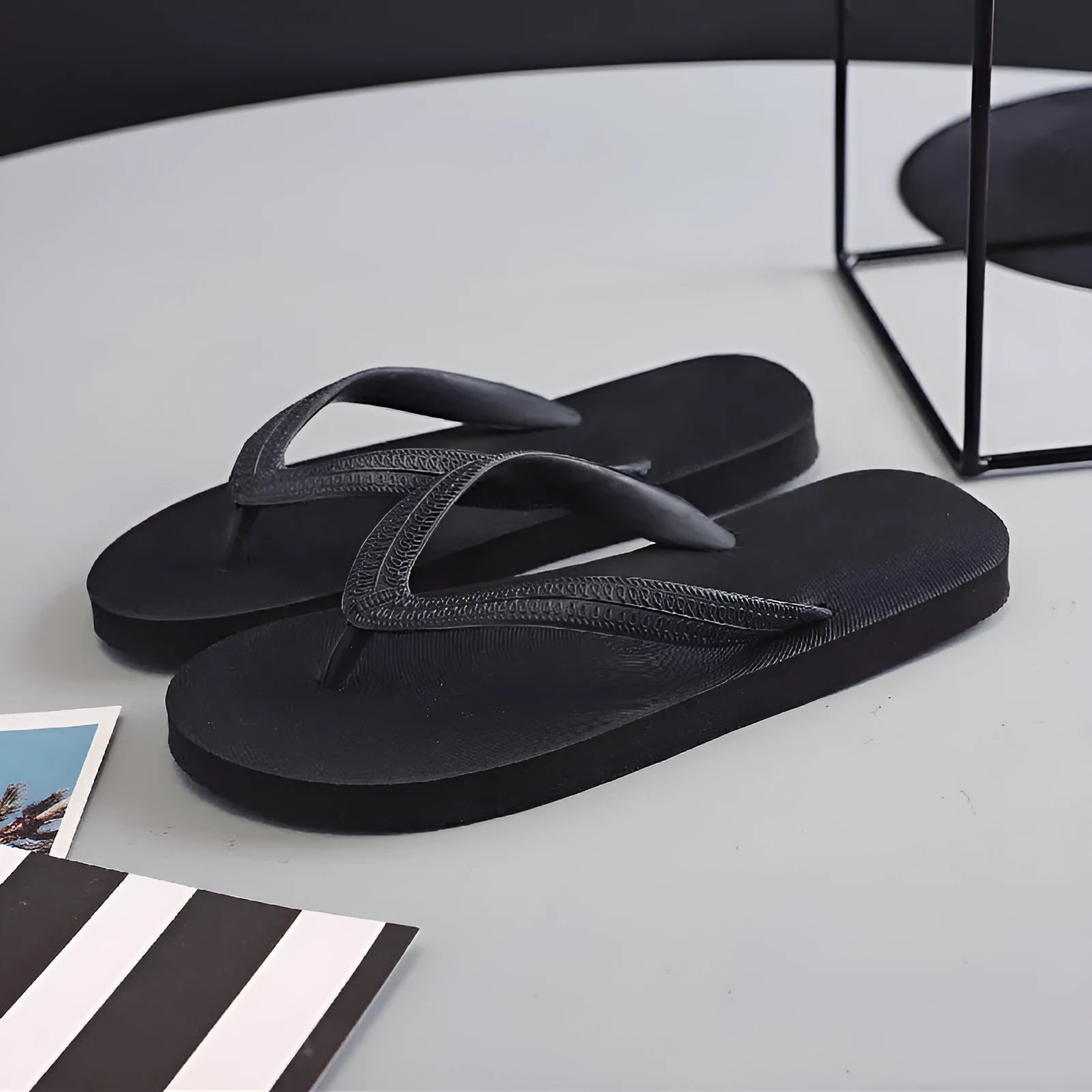 Fish label rubber flip-flops in four colours with non-slip deodorant soles, shown with size guide