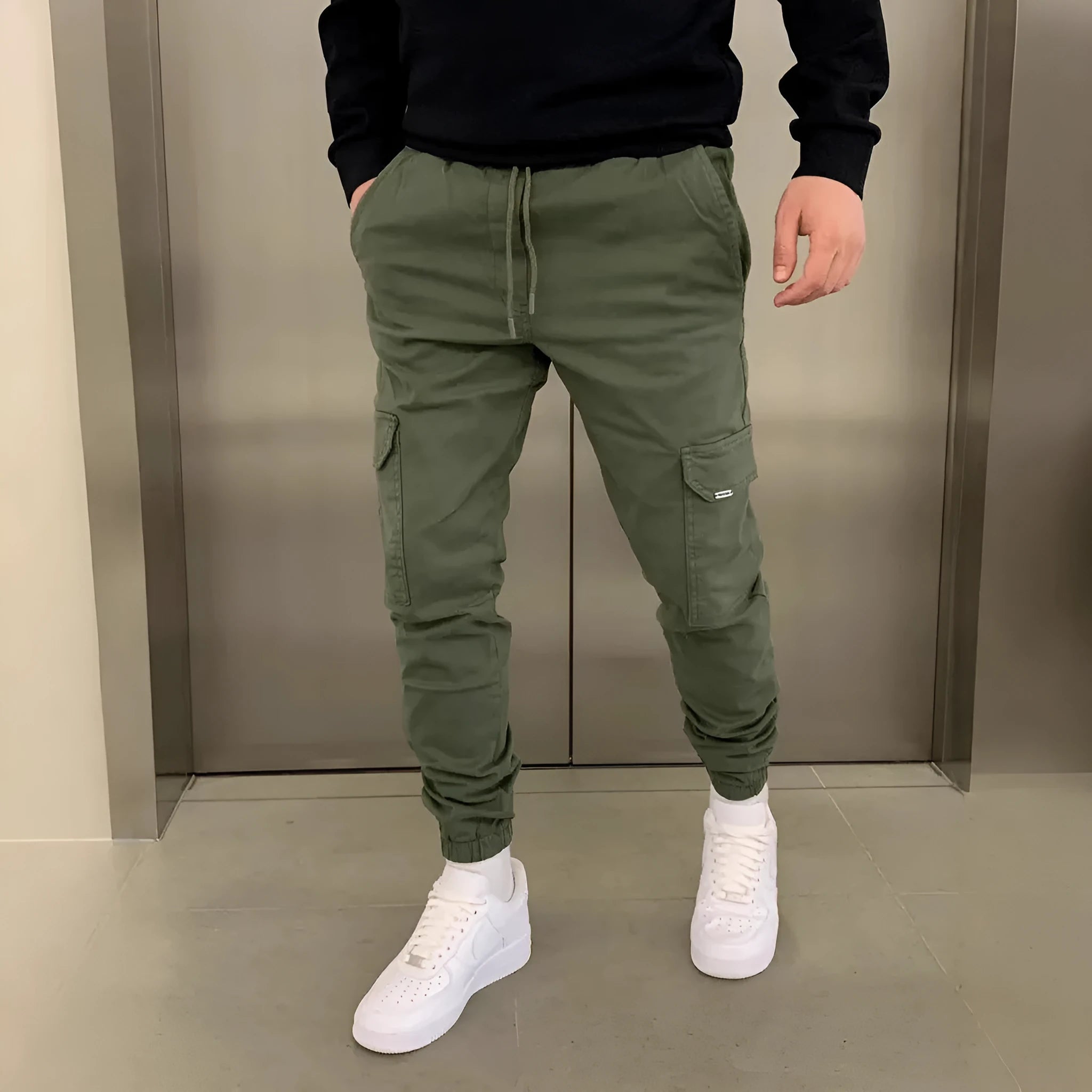 Men's light blue polyester baggy trousers with dimensional patch pockets and straight leg casual styling