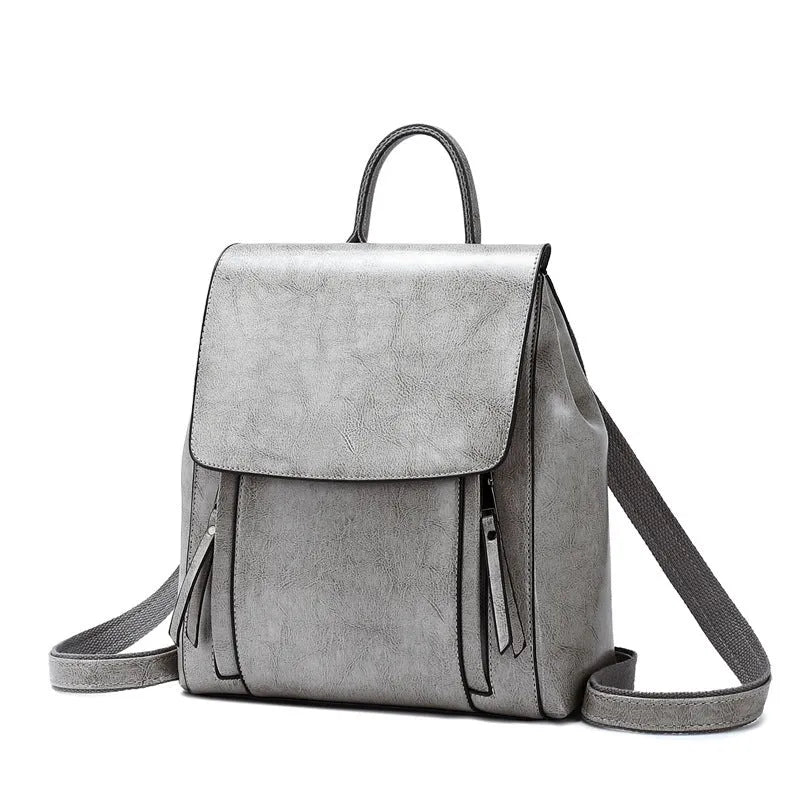 Genuine leather women's backpack in oil-wax cowhide with multiple internal pockets and compartments
