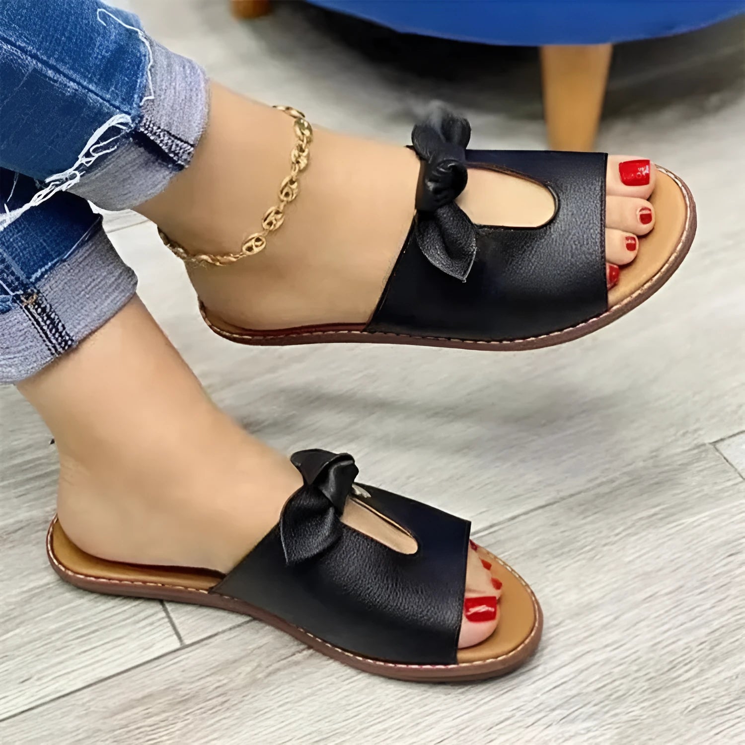 Ladies casual sandals with bow detail and fish mouth style in black, pink, and gold colours