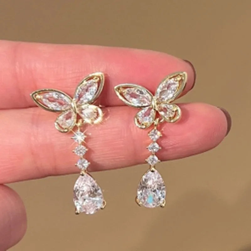 Silver-tone bow stud earrings with electroplated finish on zinc alloy