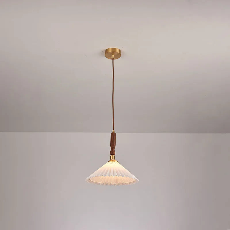 American retro style single head wall lamp with walnut wood frame and fabric shade, mounted on a wall.