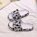 Leopard print slippers with thick EVA sole in black, pink, khaki, and white zebra patterns for women's indoor outdoor summer wear
