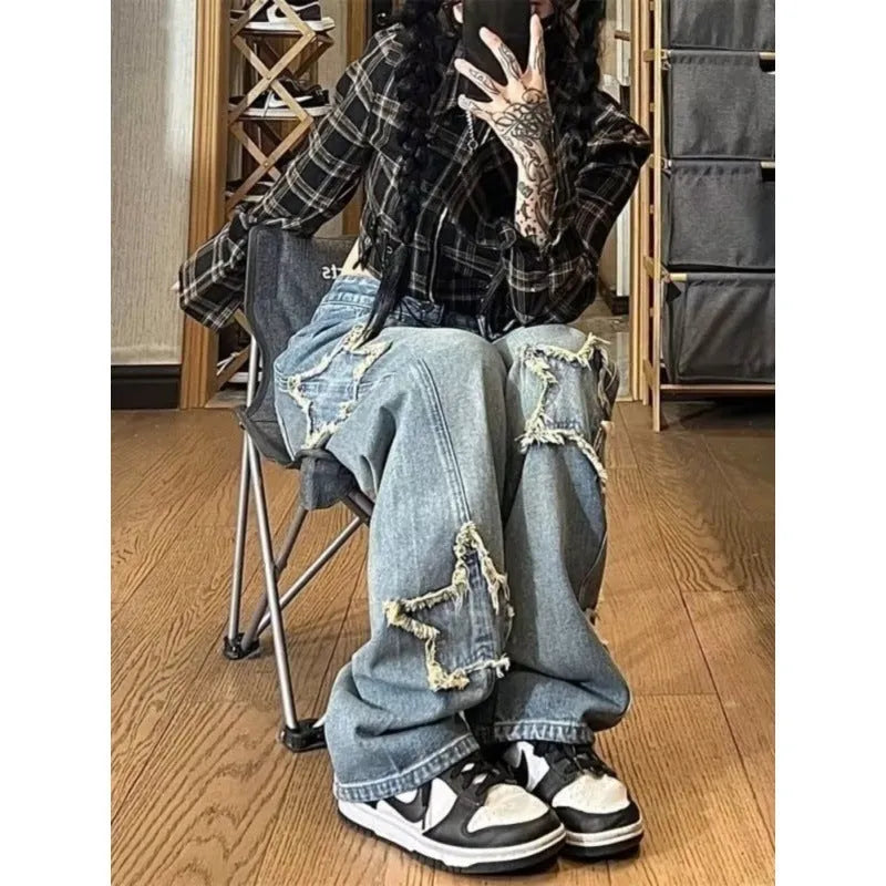 Blue high-waist wide-leg denim trousers with straight cut on mannequin