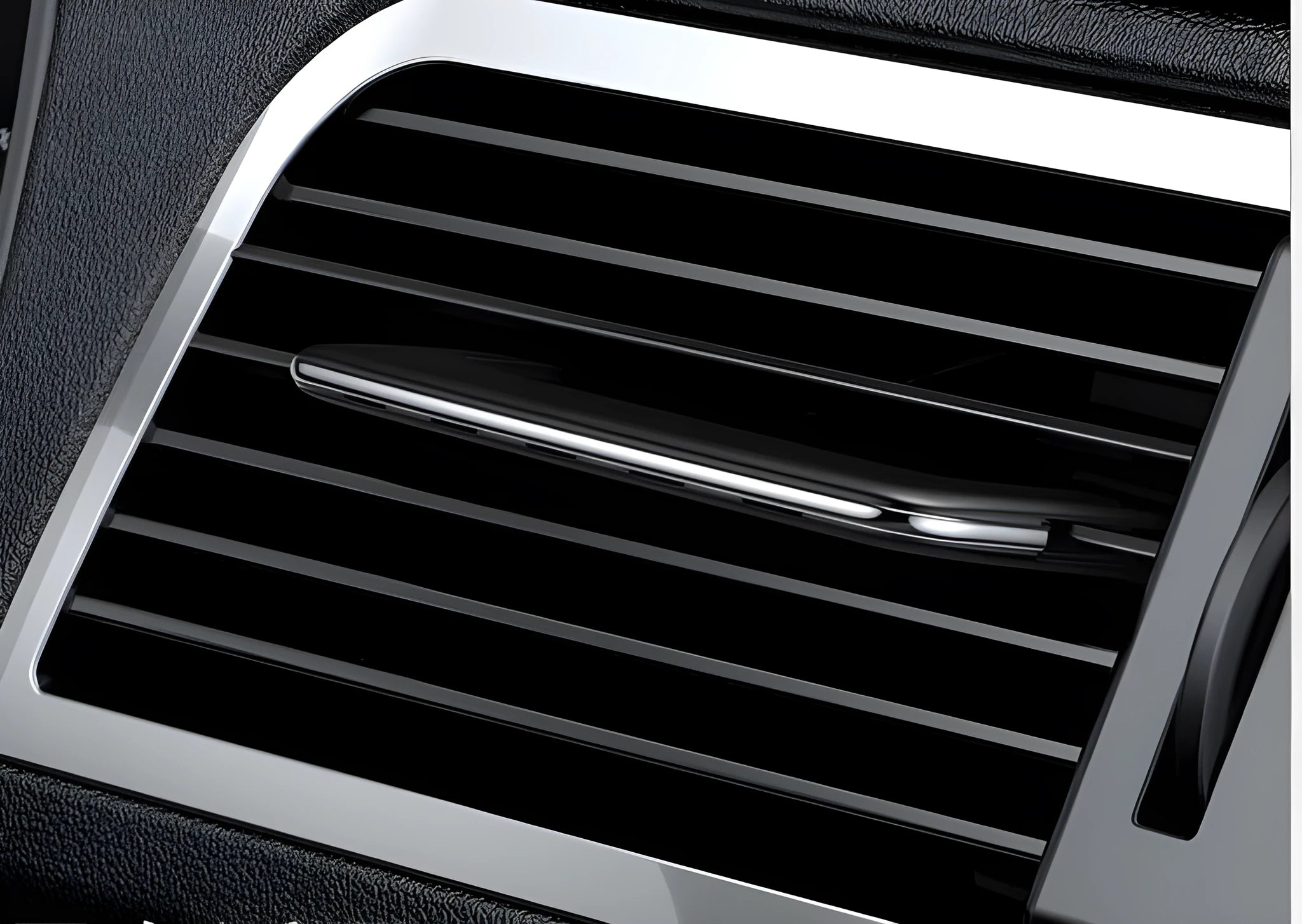 Car air-conditioning vent clip aromatherapy diffuser in black with floral scent, paddle design