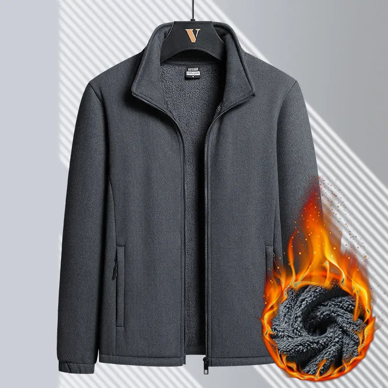 Man wearing a thick grey Berber fleece coat cardigan with a stand-up collar and zippered front.