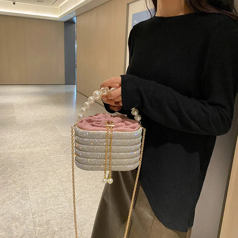 Women's crossbody bag with pearl beaded detailing in soft PU leather showing European retro style and single shoulder strap