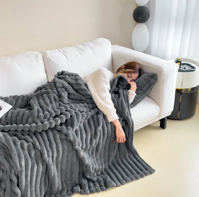 Soft wind bubble velvet faux rabbit fur blanket in a solid colour, showing double-sided thickening texture.