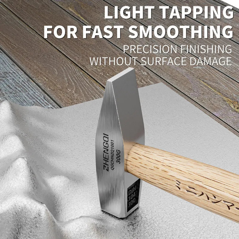Mini claw hammer with wooden handle and high carbon steel head on a workbench
