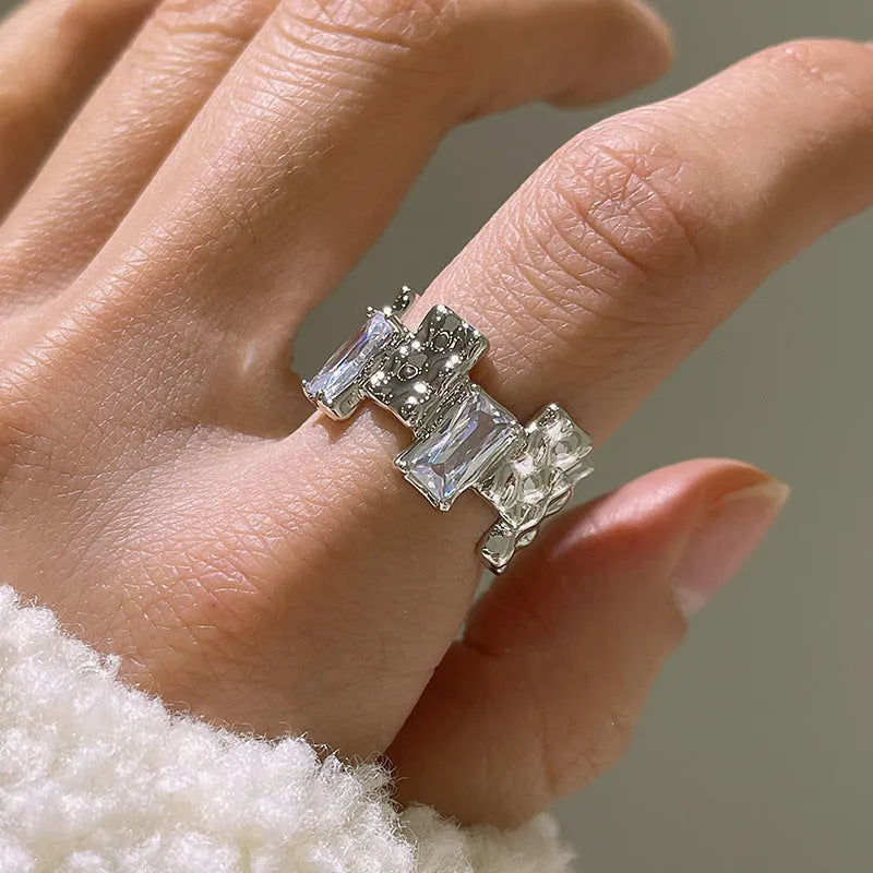 Silver-plated geometric open ring with cross zircon centrepiece and three-dimensional decoration