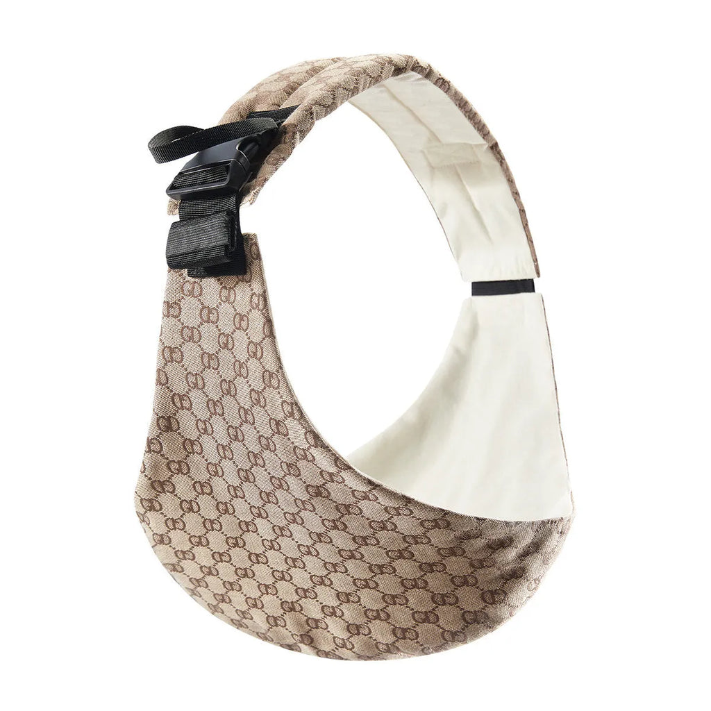 Front-carrying polyester baby sling carrier in pure black colour with adjustable straps for infant carrying up to 20kg