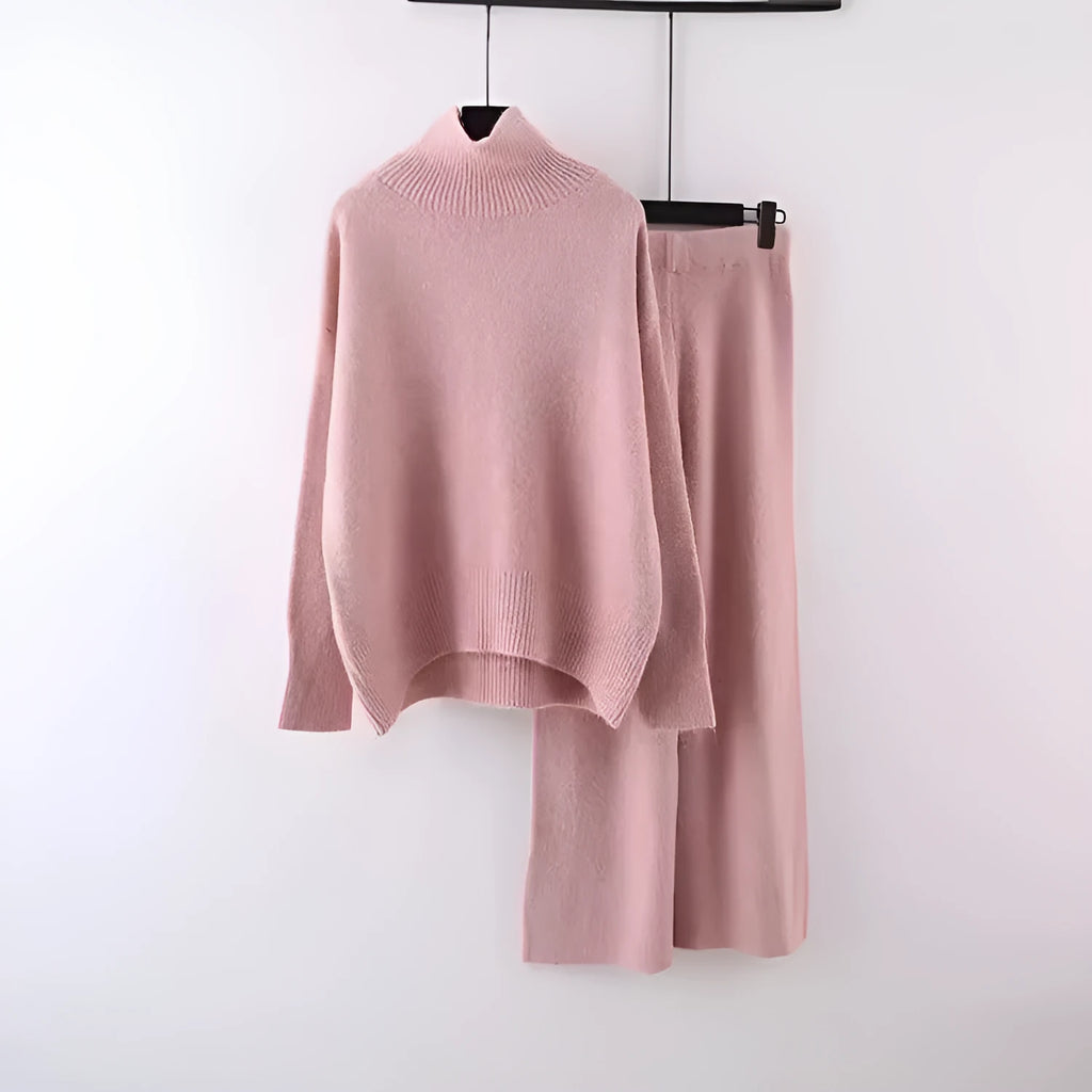 Women's casual two-piece set showing sweater and wide leg trousers in solid colour with thread detail