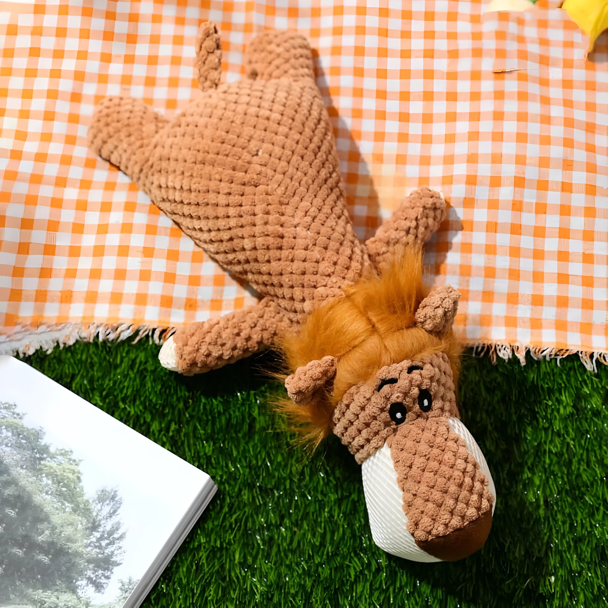 Colourful plush dog toy in animal shape with corn kernel texture and squeaker.