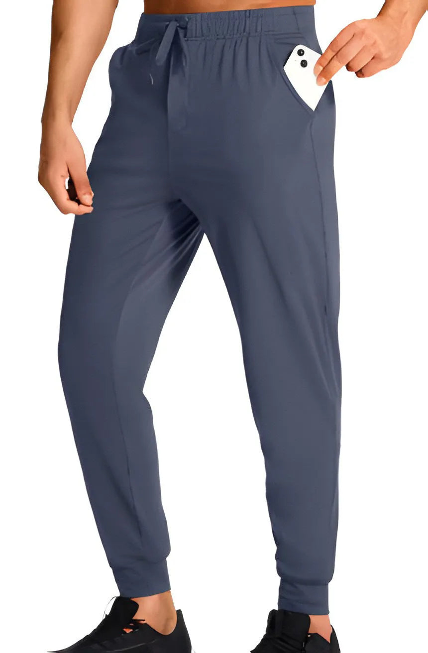 Men's loose fit casual trousers in polyester fabric available in multiple solid colours and sizes