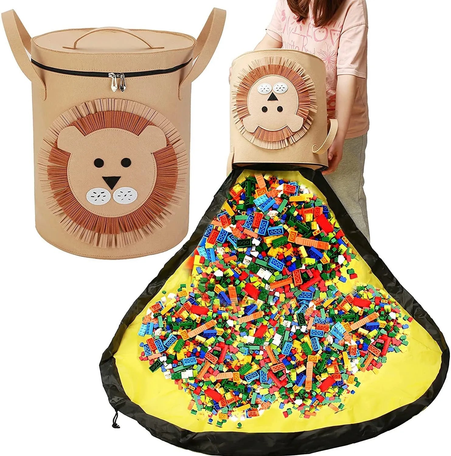Green felt cube storage bag with pull rope, laid flat as a play mat for toys.
