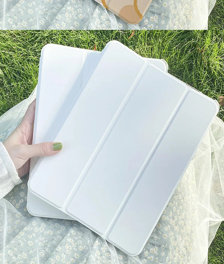 Silicone tri-fold iPad case with cartoon rabbit design shown protecting a tablet