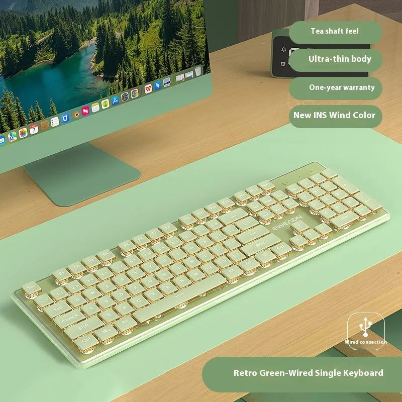 Prewalker V3 silent keyboard and mouse set in retro green colour on a desk.