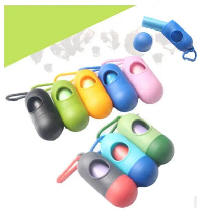 Black plastic dog poop bag holder with a metal side hook and Velcro strap, showing compact size.