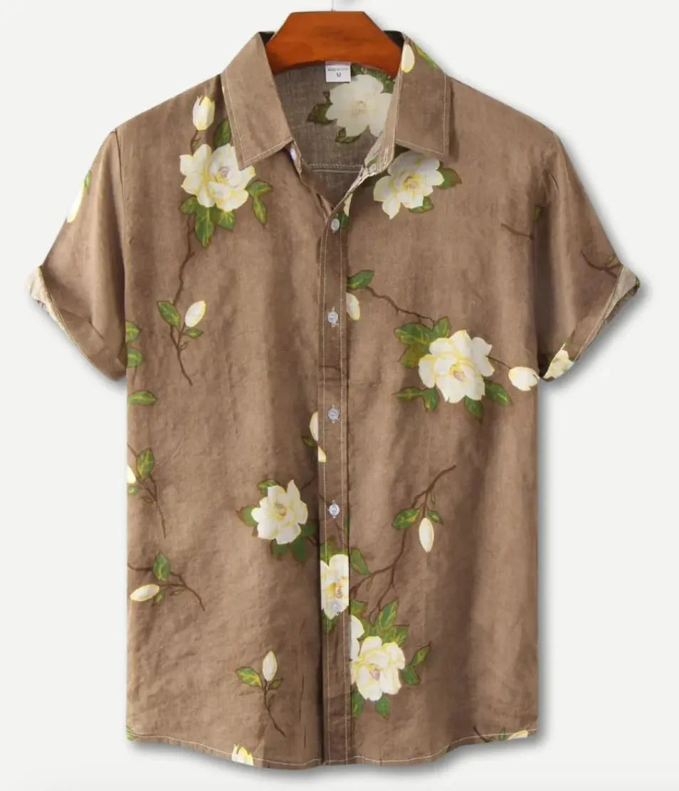 Man wearing a short sleeve floral Hawaiian shirt with lapel collar, made from elastic polyester fabric.