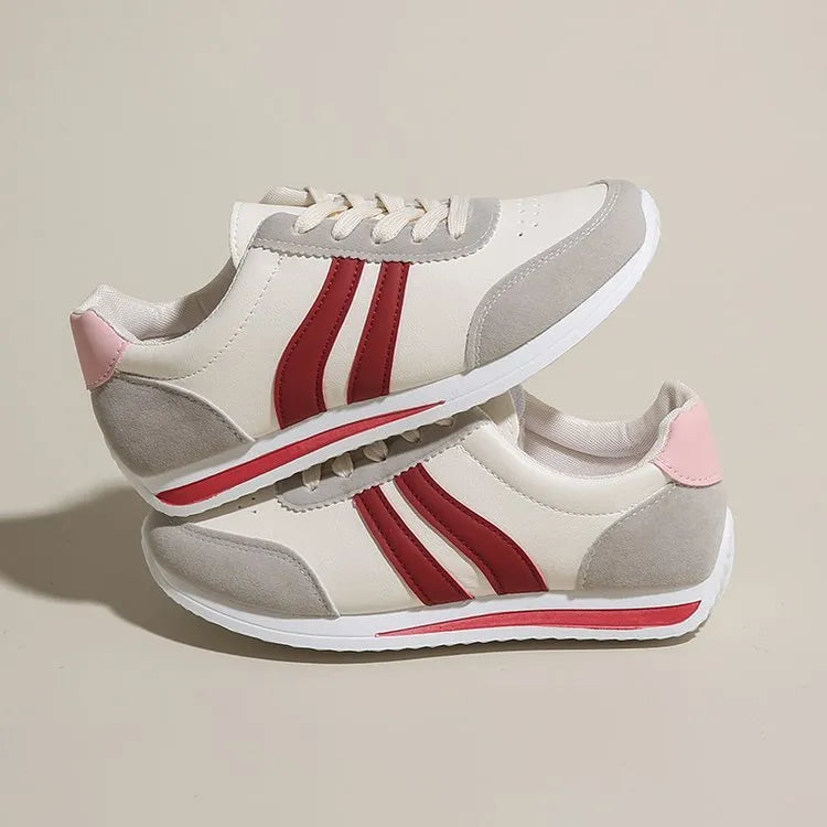 Red and blue lace-up running sneaker with soft rubber sole and PU mesh upper