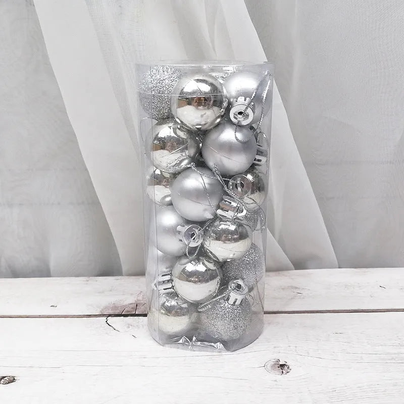 Assorted 3cm shiny gold, red, and silver Christmas ball ornaments spilling from a tall storage barrel.