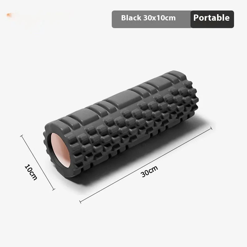 EVA foam roller for fitness in various colours and sizes on a gym floor.