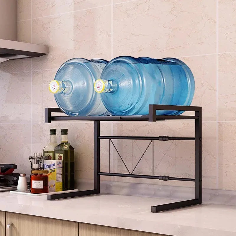 Retractable metal kitchen microwave rack with two layers on a countertop