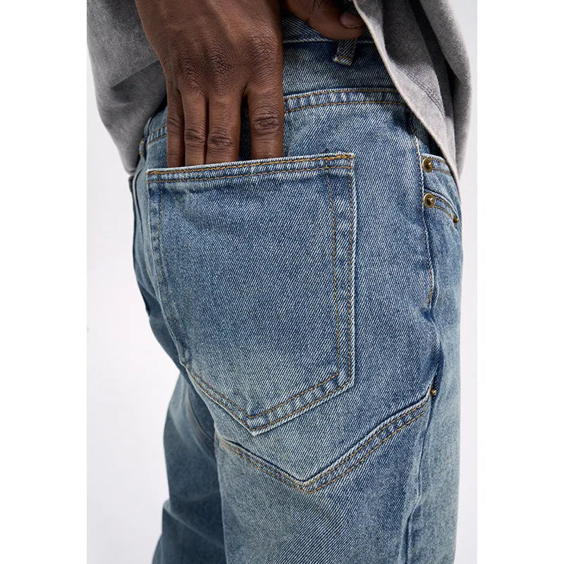 Men's casual western vintage jeans in washed blue, water-washed denim with zipper fly, front view