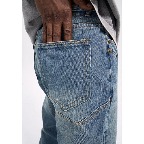 Men's casual western vintage jeans in washed blue, water-washed denim with zipper fly, front view