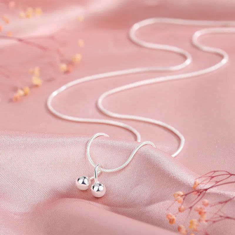 Adjustable silver cherry necklace with snake bone chain and fruit pendant