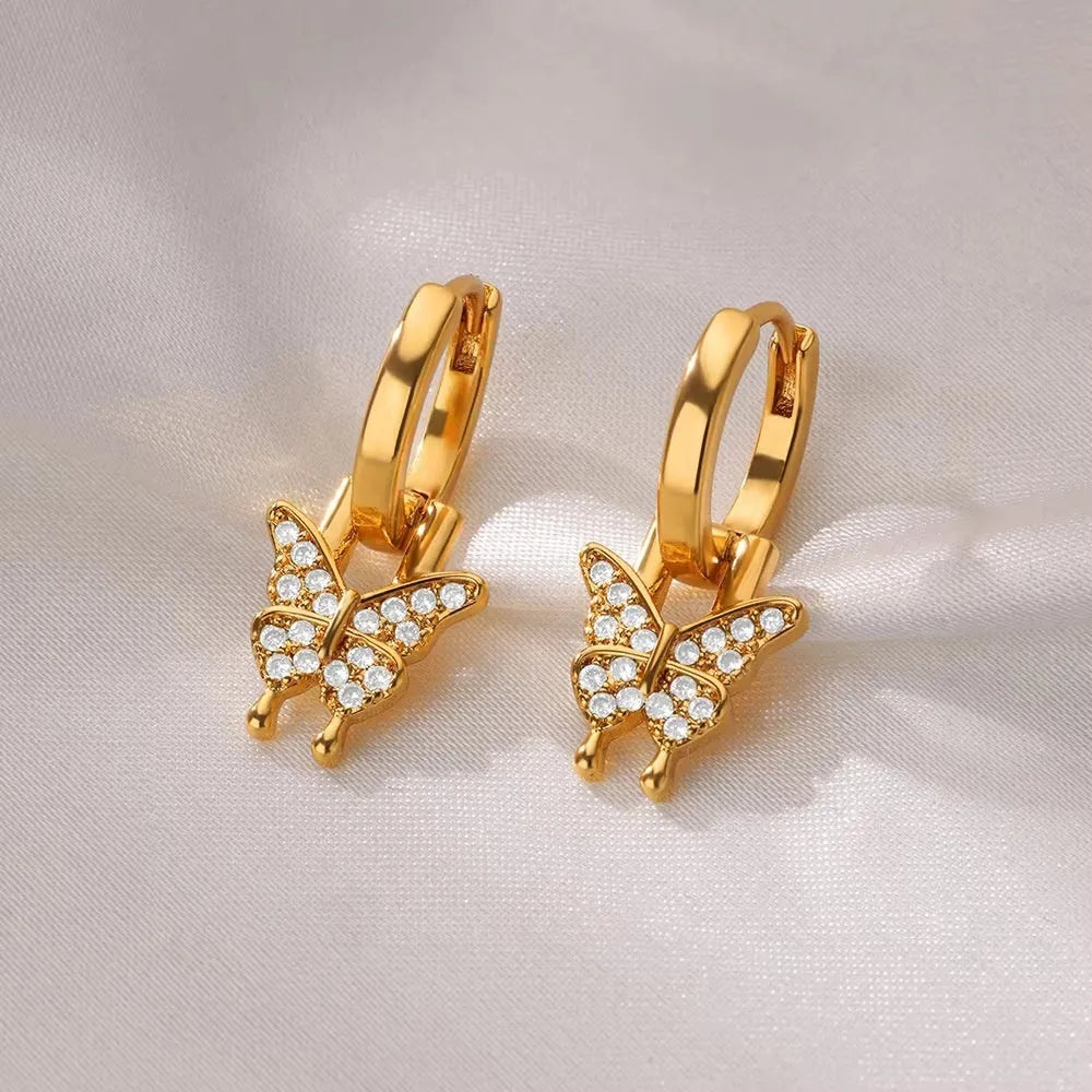 Irregular geometric butterfly earrings with heart and star shapes in copper with multiple colour options